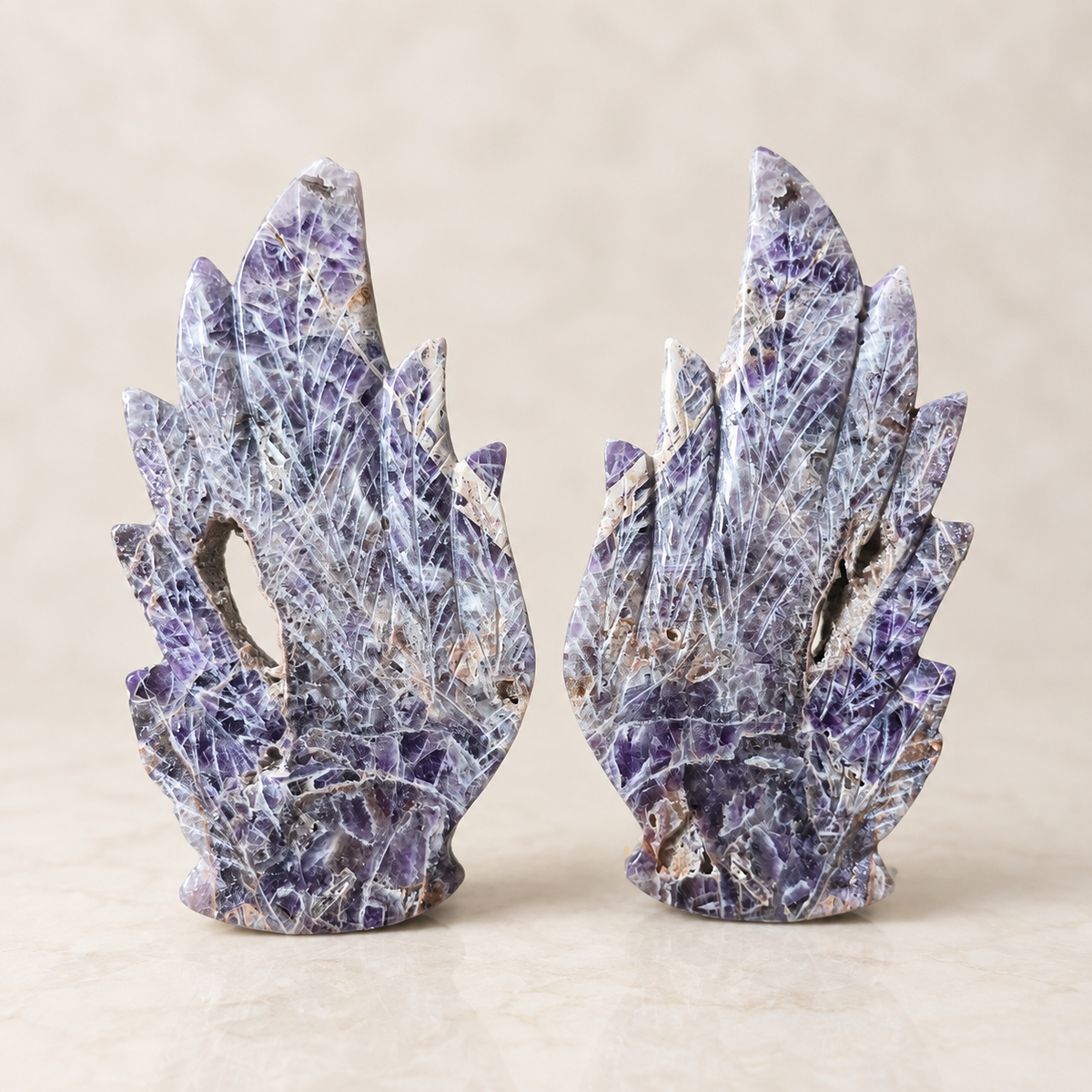 Chevron Amethyst crystal wing carving with purple and white banding