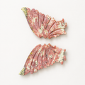 Unakite crystal wing carving with salmon-pink and pale green patterning