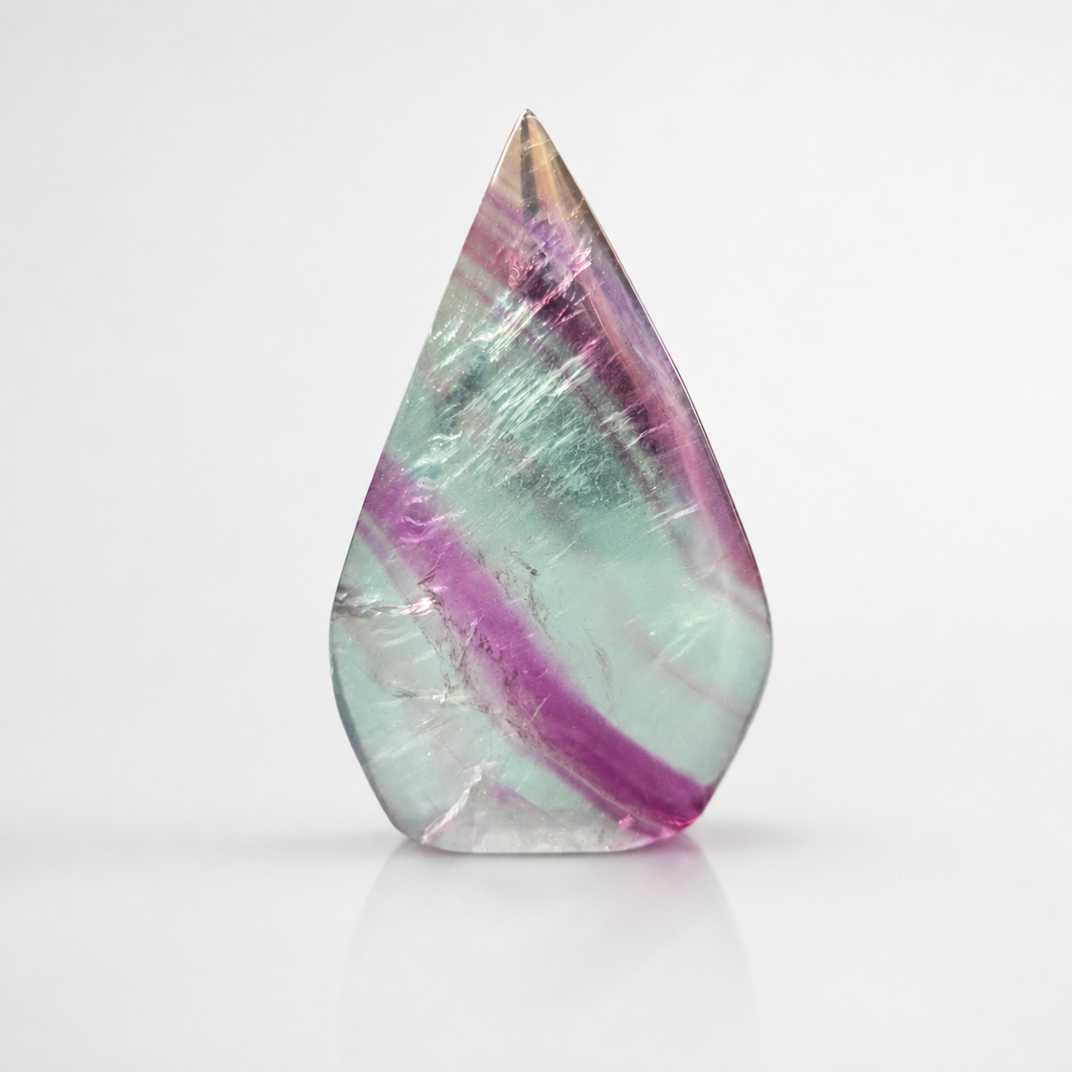 Fluorite Flame 5 polished crystal carving with green and purple tones