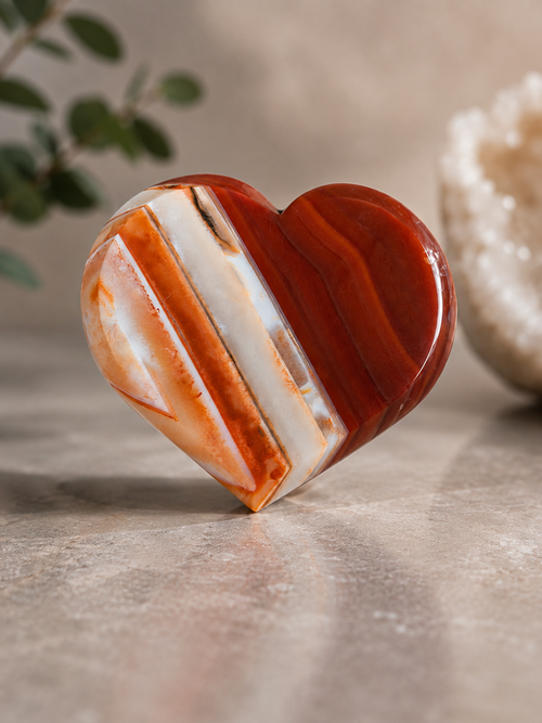 475g Carnelian Agate heart crystal with orange-red banding and druzy