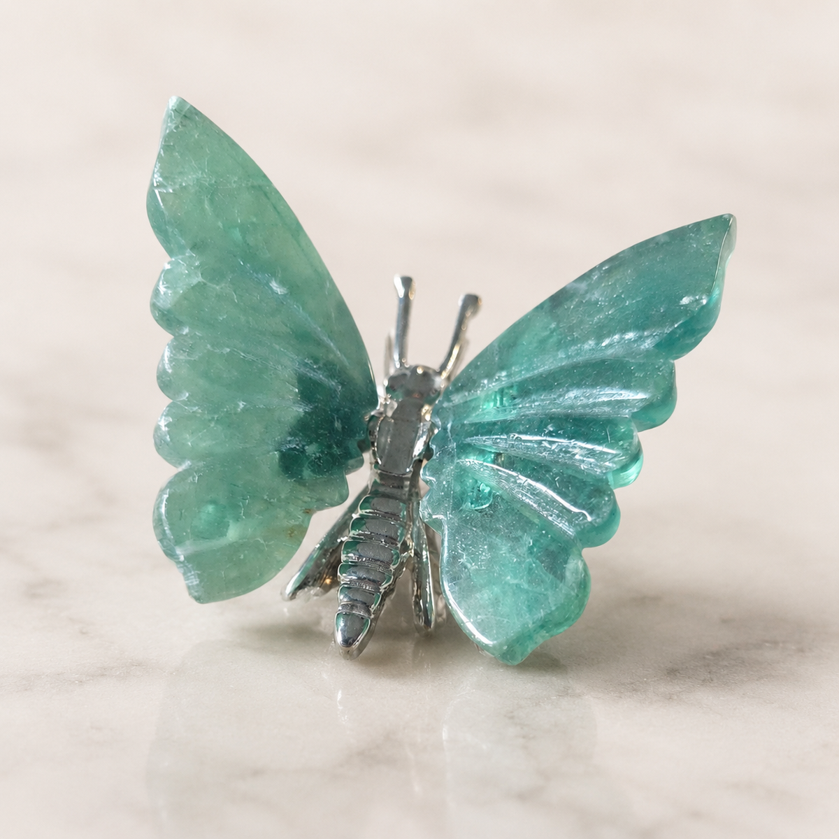 Green Fluorite butterfly crystal carving with translucent wings