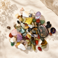 Mixed crystal scoop with assorted tumbles chips raw pieces and mini carvings