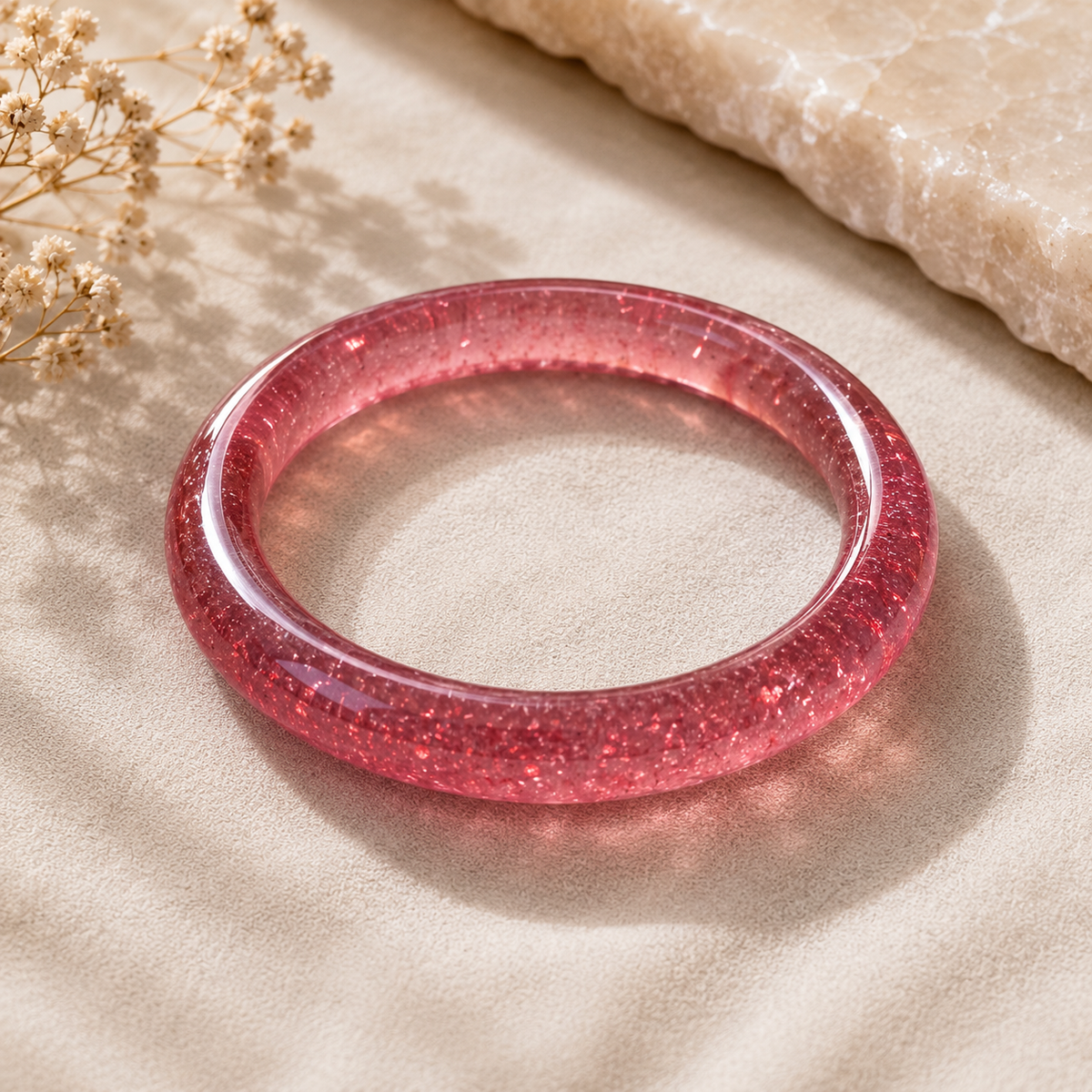 Strawberry Quartz polished crystal bangle with rosy-pink shimmer