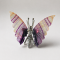 Fluorite butterfly crystal carving with purple banded wings