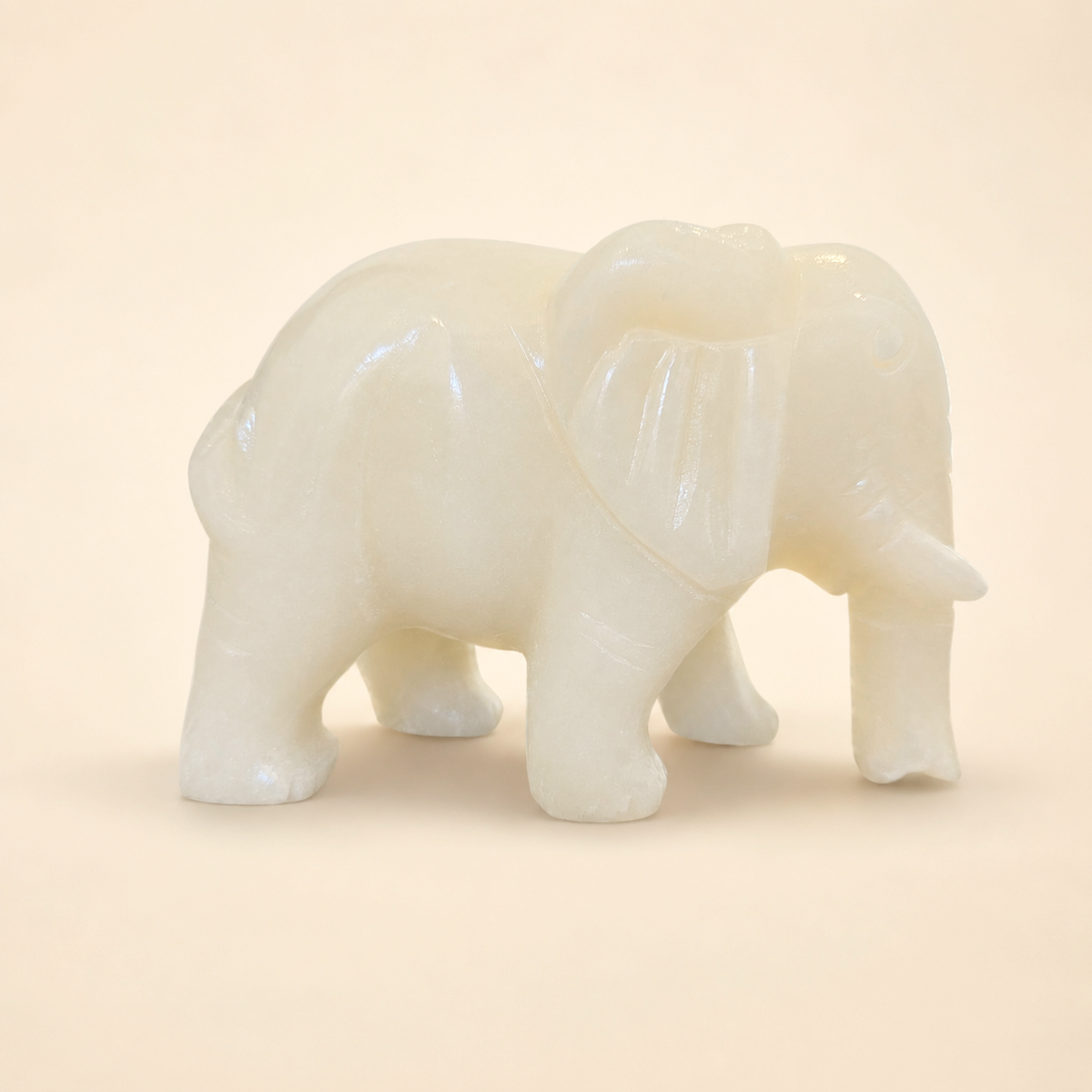 1390g White Jade elephant crystal carving with creamy-white polished stone