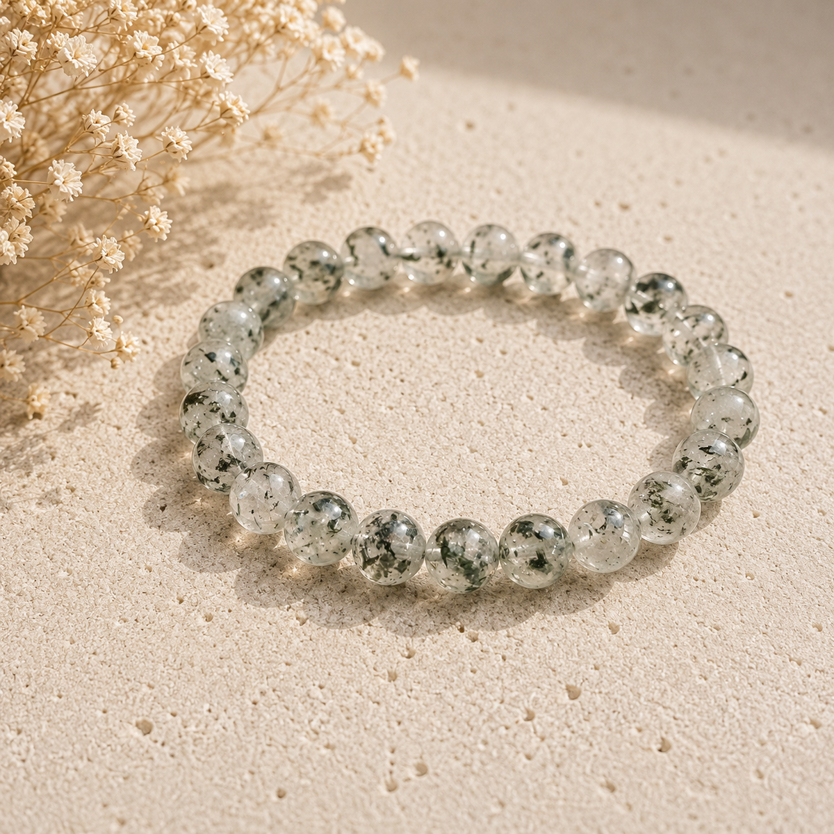 Moss Agate polished bead crystal bracelet with green moss-like inclusions