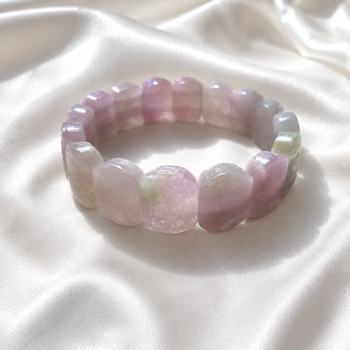 Kunzite polished crystal bracelet in blush pink and lilac tones