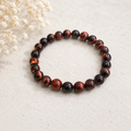 Red Tiger's Eye polished bead crystal bracelet in red and mahogany tones